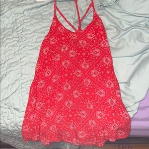 red patterned tank top
